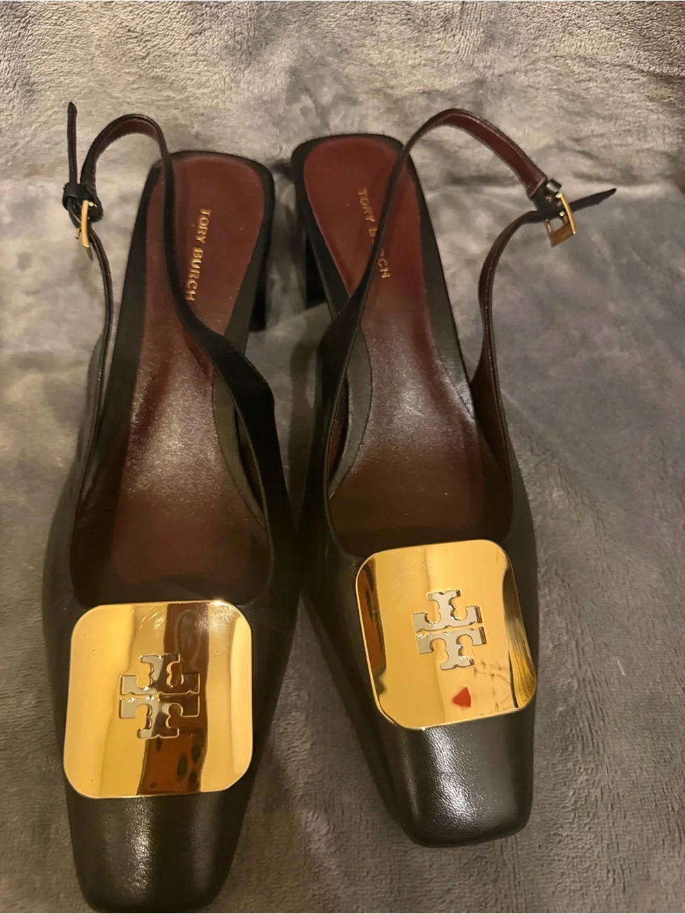 Tory Burch Black Leather Slingback Mules with Gold Plaques